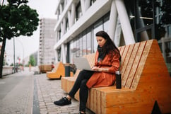 woman working remotely outdoors
