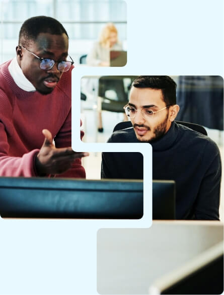 Two people collaborating with a computer