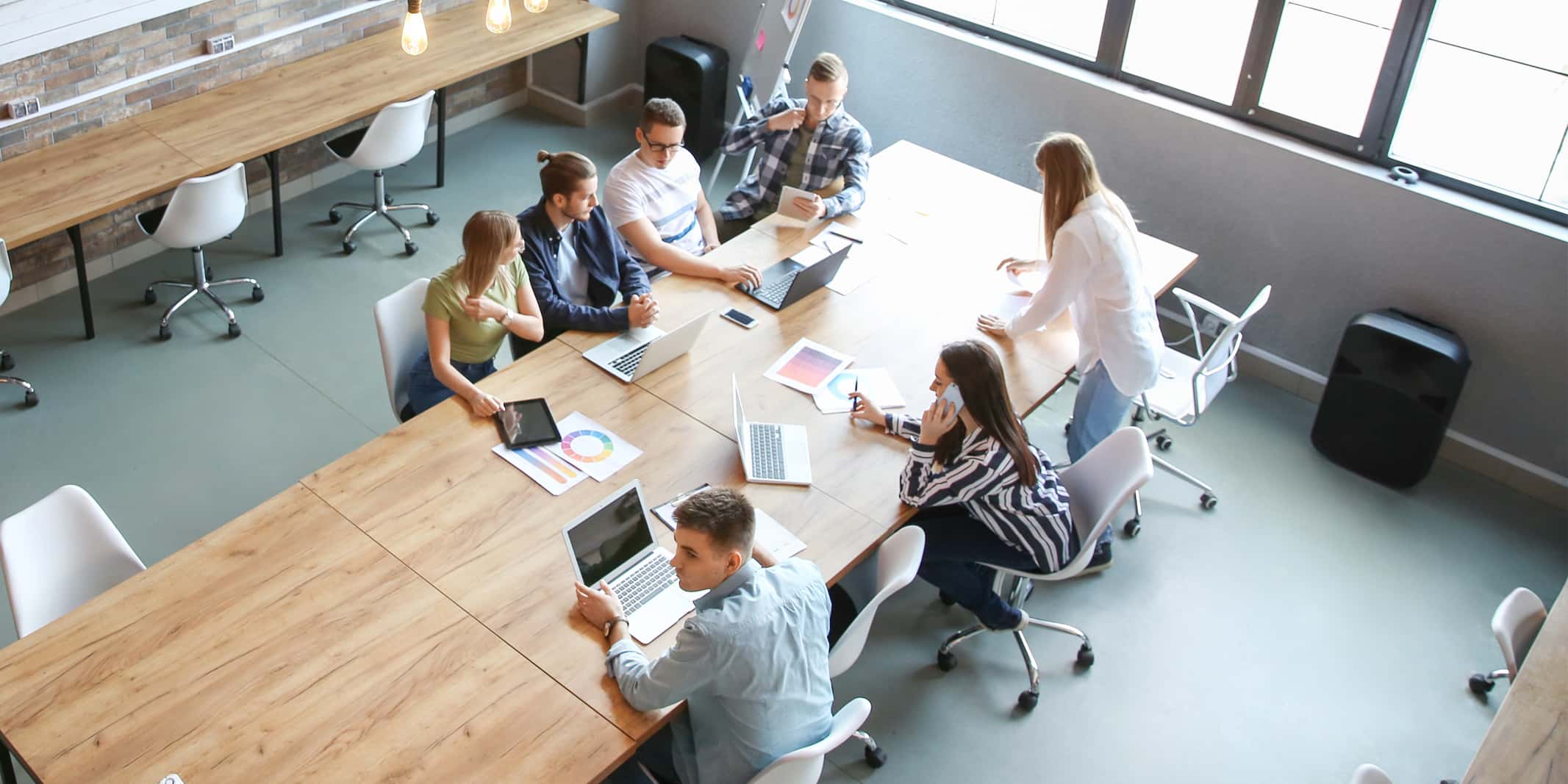 Employees collaborating in a modern workplace environment