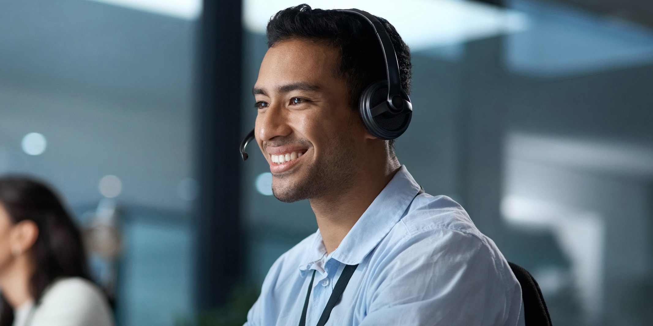 happy contact center agent talking with a customer