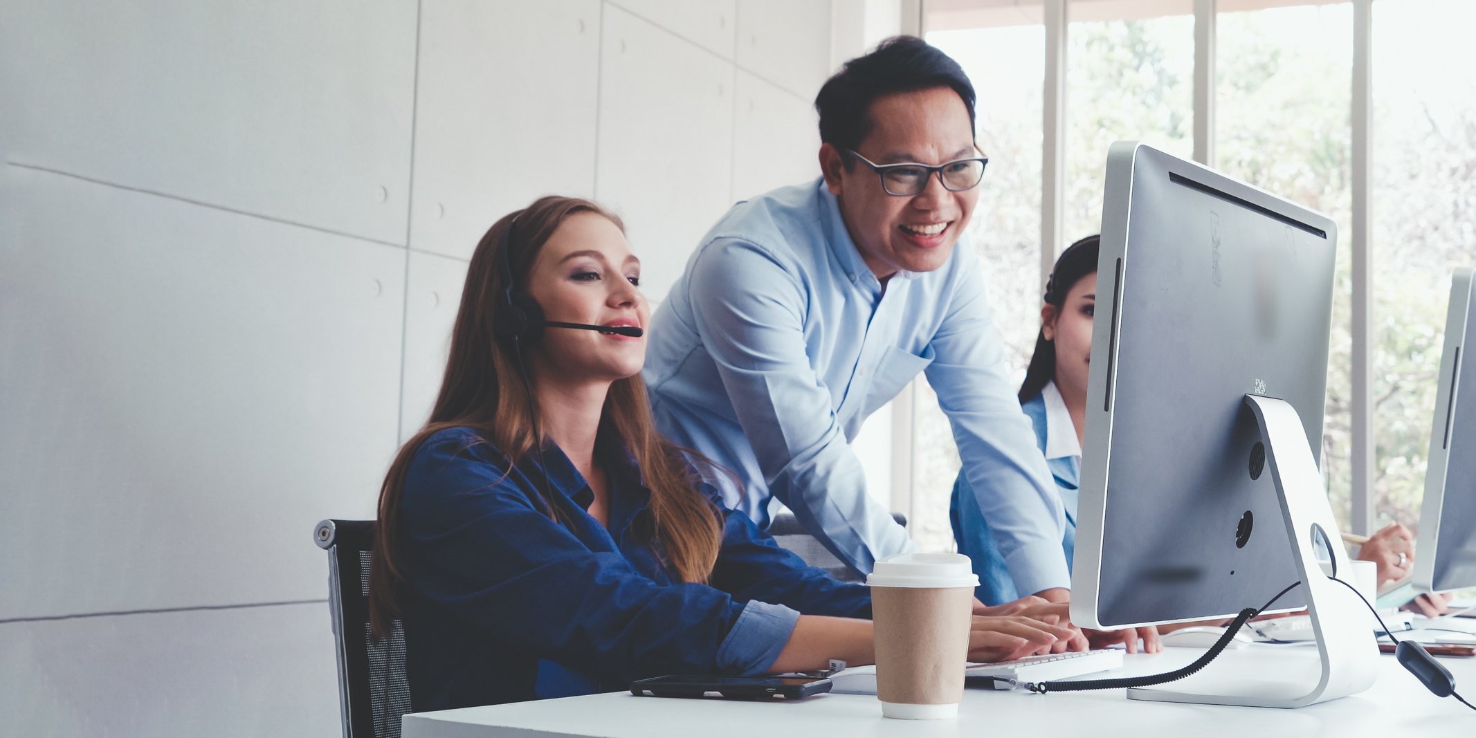 two contact center agents delivering a personalized customer experience