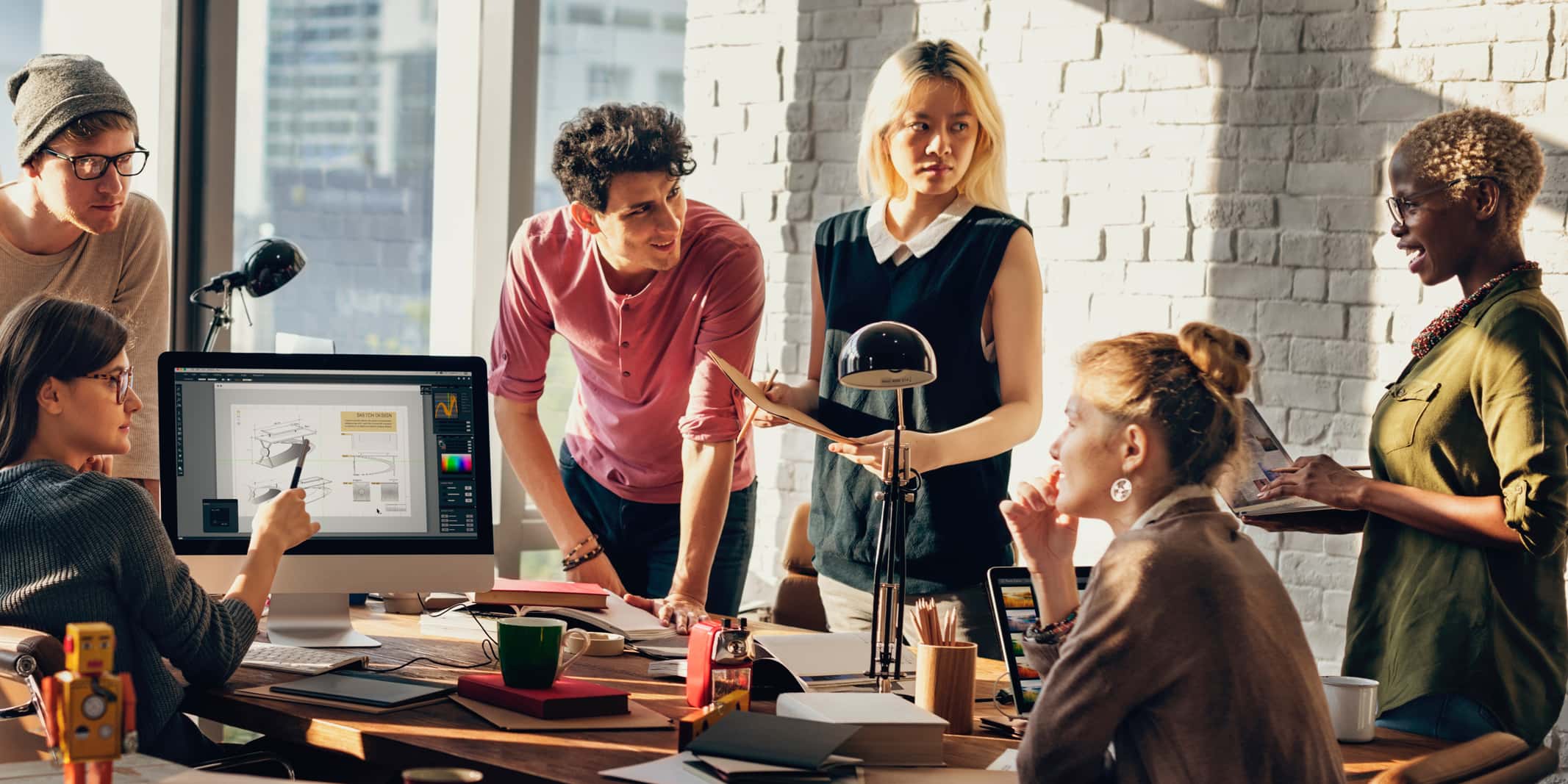 Coworkers collaborating in modern office