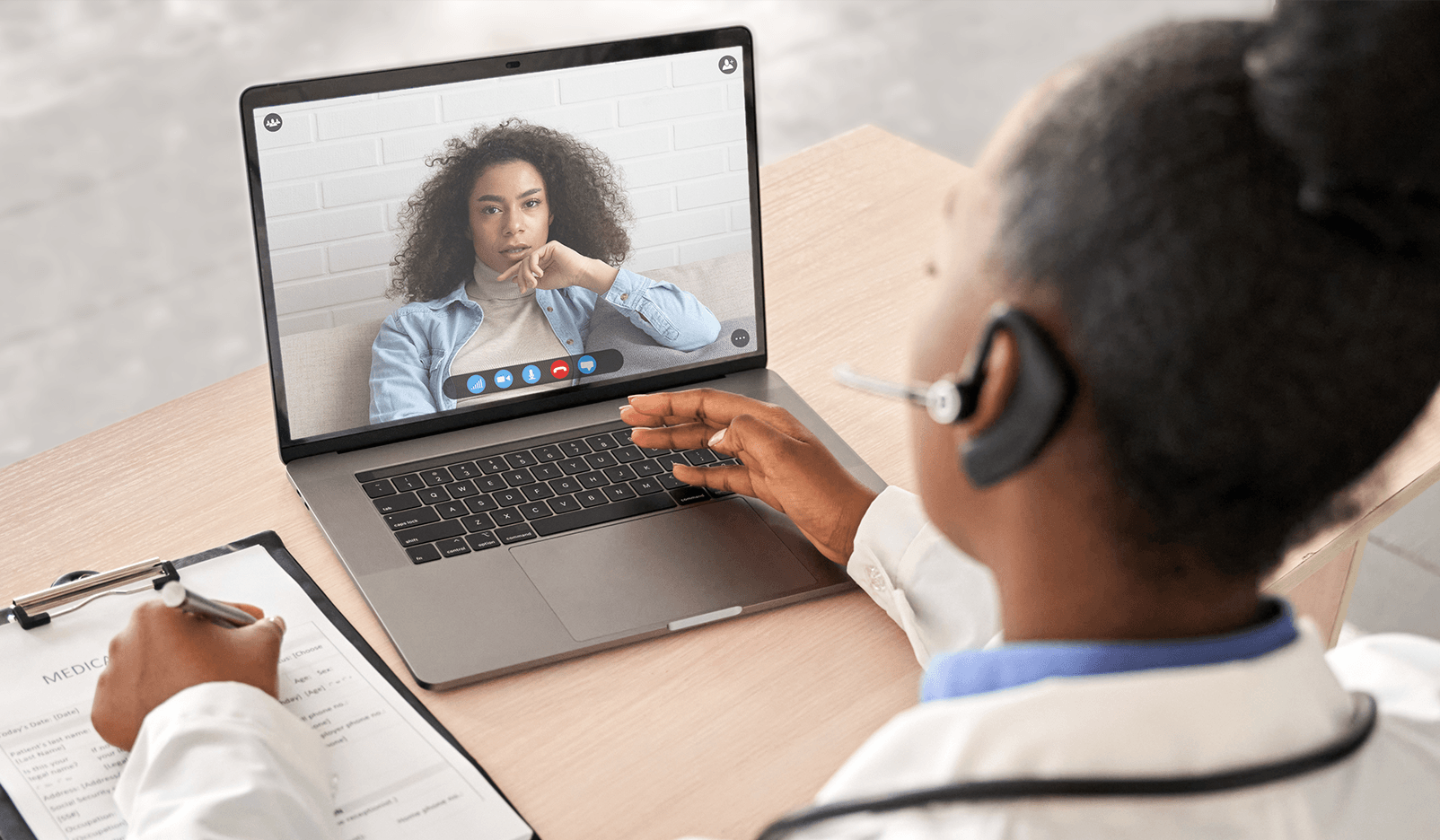 a healthcare provider and patient in a video call