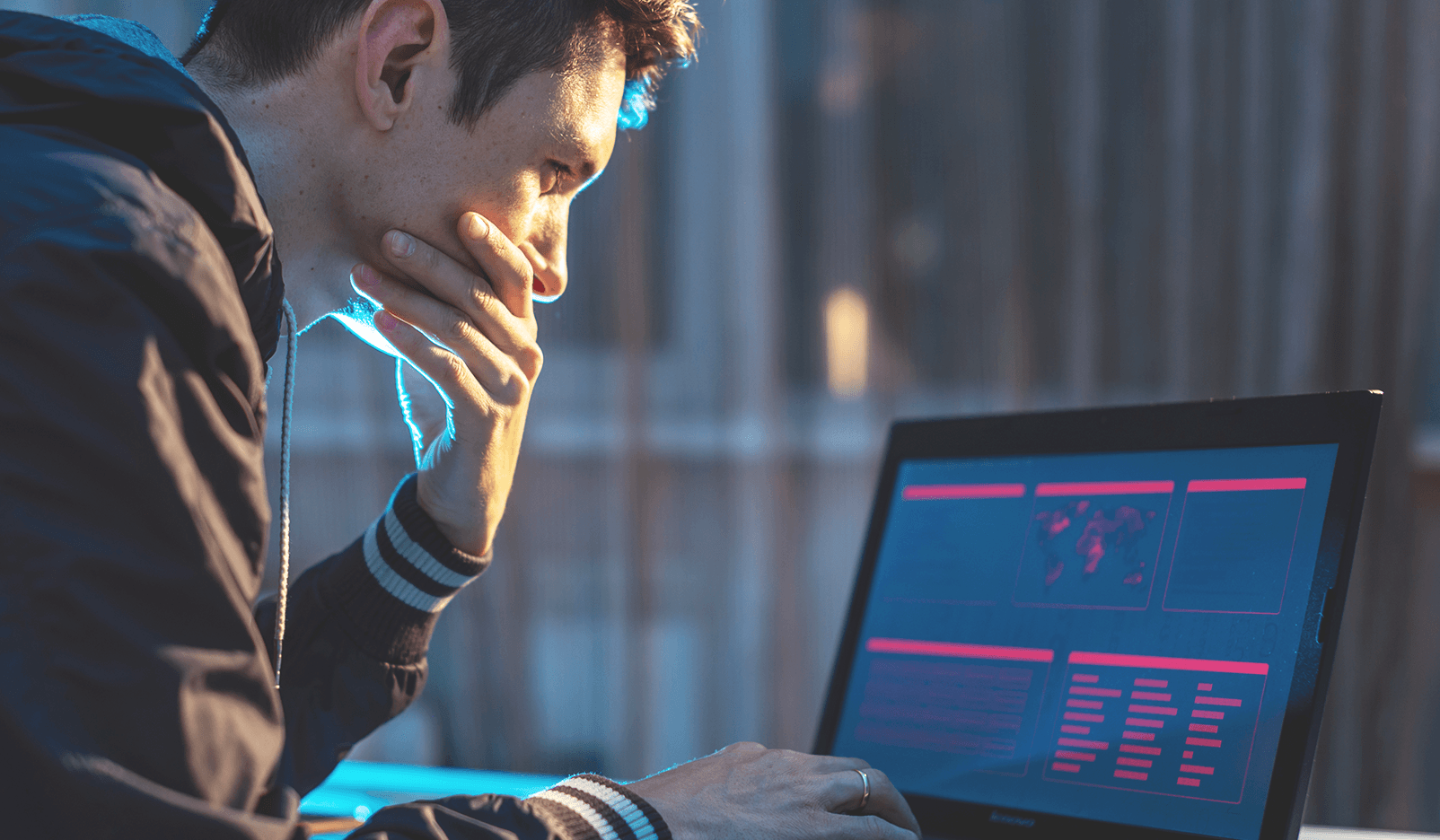 a hacker viewing his computer screen