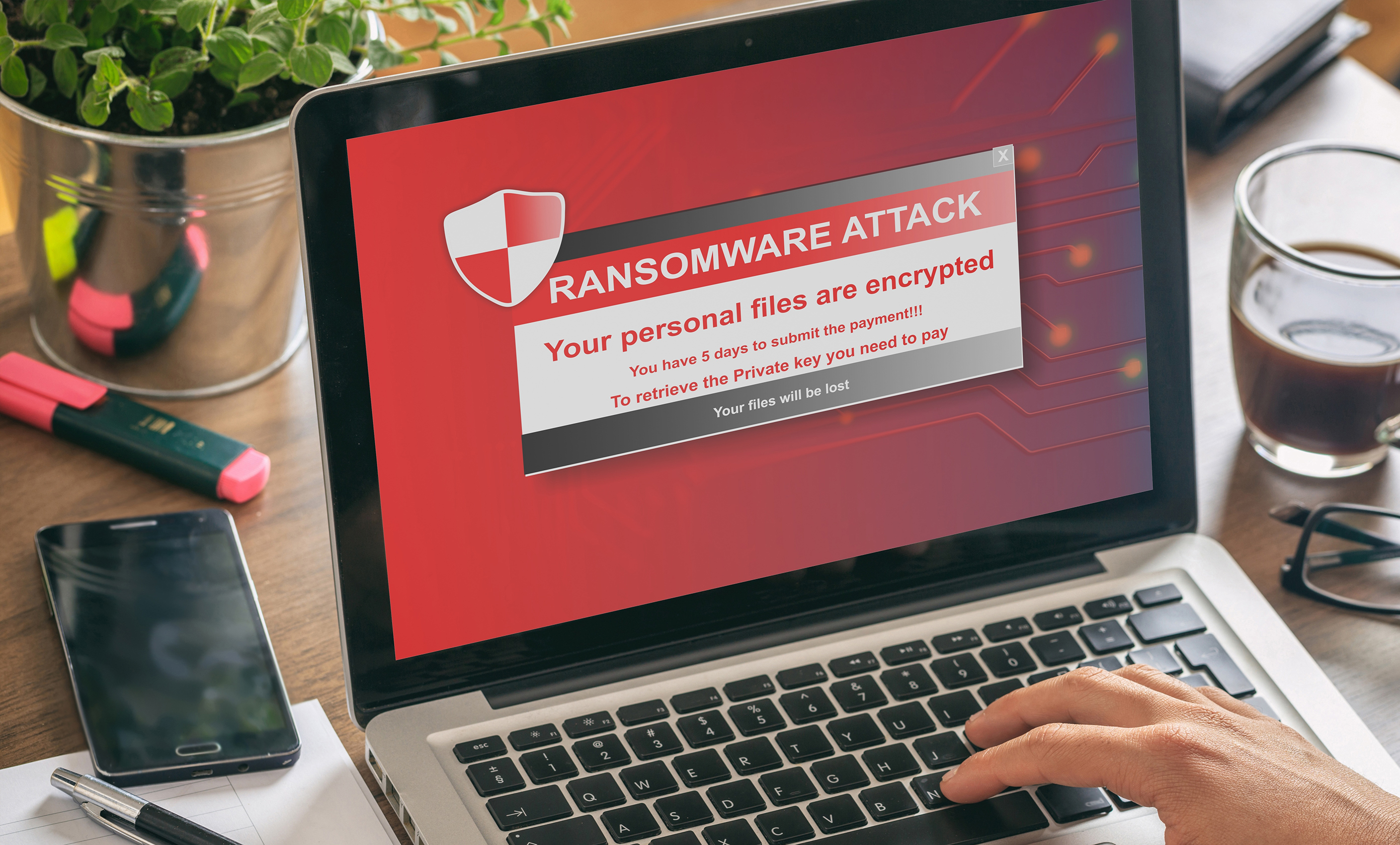 ransomware attack notification appearing on work laptop screen